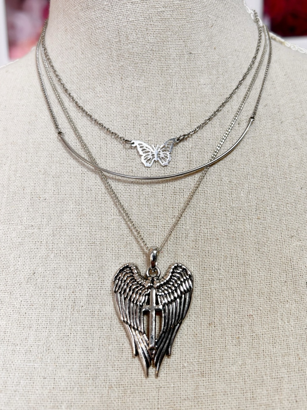 A trio of silver-toned necklaces, dainty necklace stack Angel Wings, Butterfly